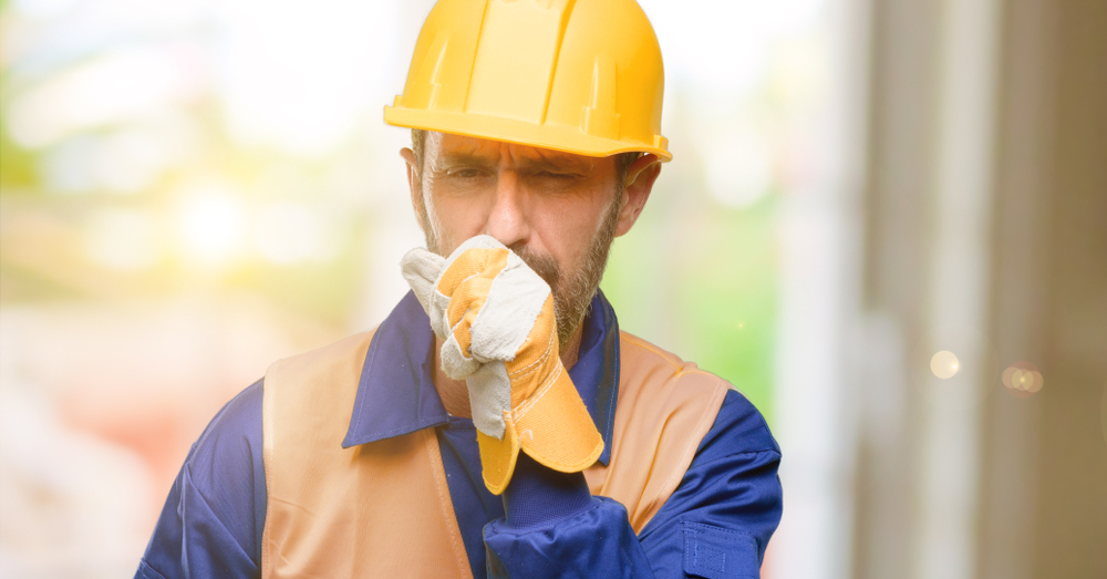 Construction worker with mesothelioma coughing