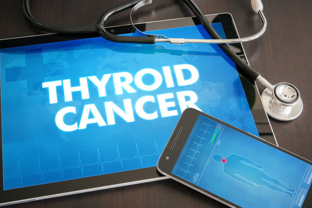 Tablet displays the words “thyroid cancer”