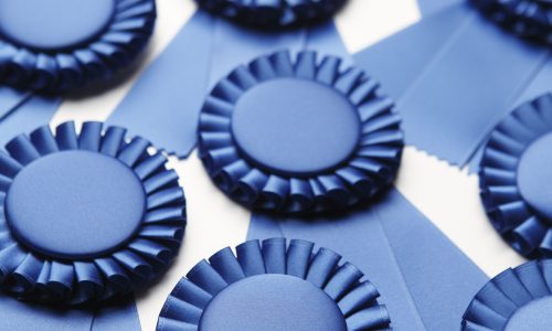 An array of blue ribbons. Shot with shallow depth of field.