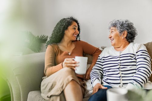 Two women discuss lifestyle changes to prevent cancer.